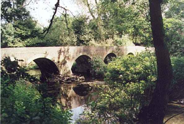 Four Arches bridge at the end of the Dingles on the River Cole