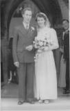 Ron Wright and Peggy Jones on their wedding day plus Bob Wright in the background